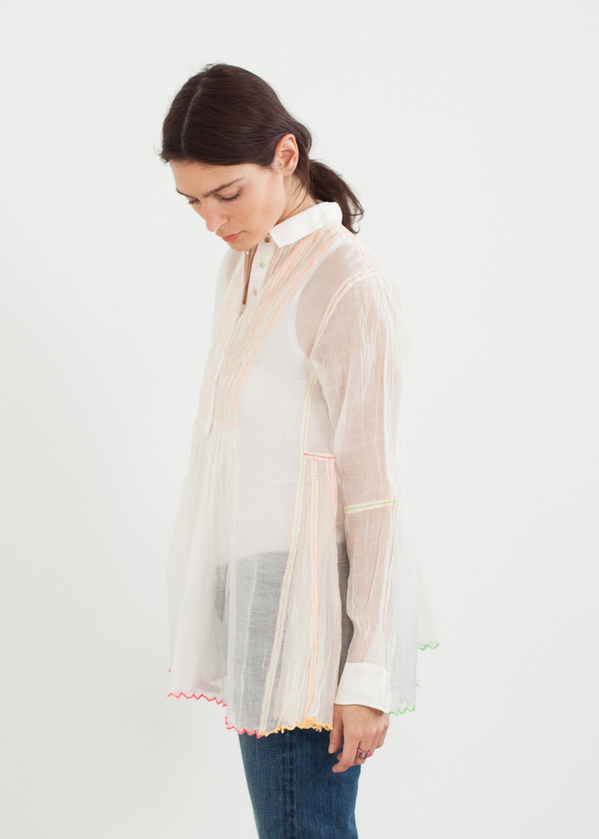 Doorschijnende regenboogblouse in wit