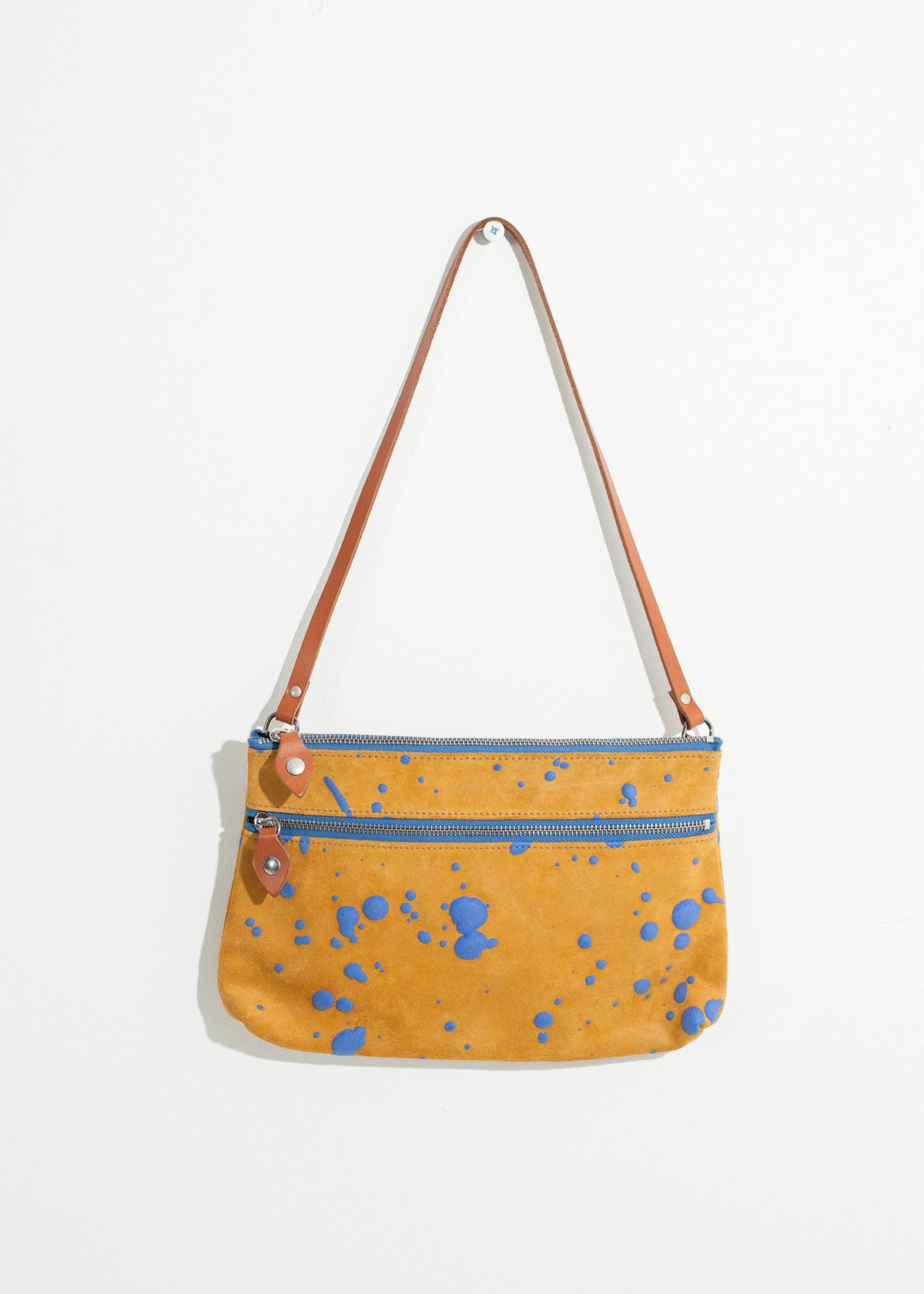 Sac à bandoulière Ink Splatter en moutarde/bleu