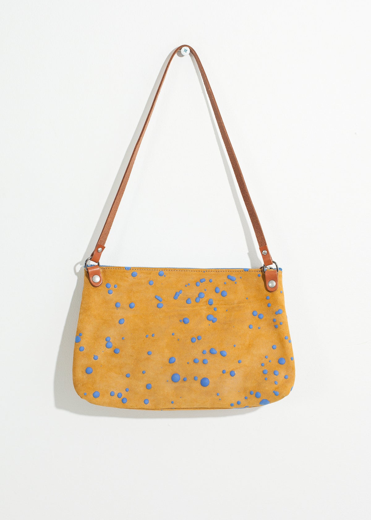 Sac à bandoulière Ink Splatter en moutarde/bleu